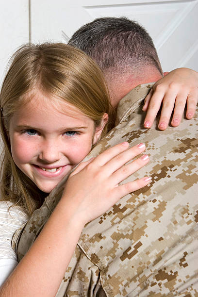 istock Soldier and his daughter 123102877