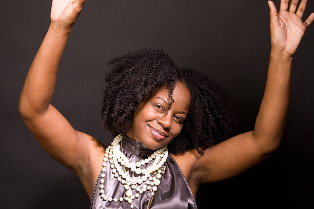 istock Woman dancing and smiling 123108134