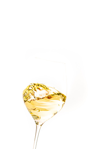 White wine swirled in a glass