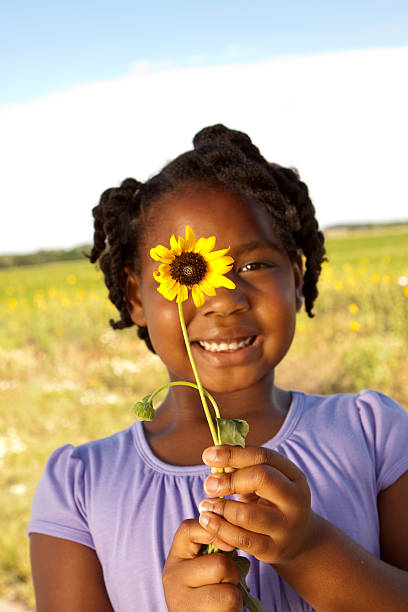 istock Cute girl with a flower 123113218