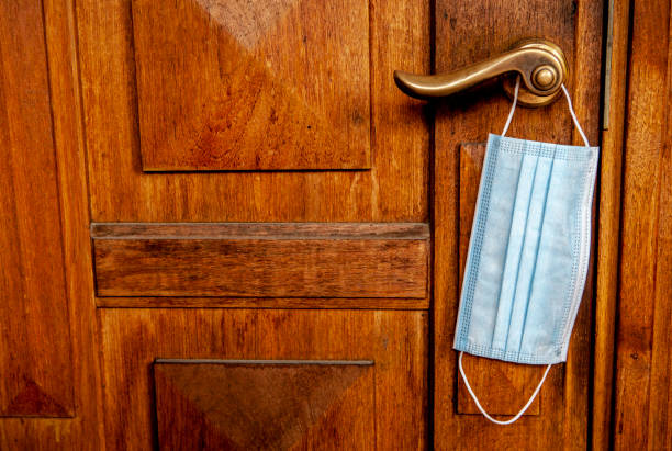 istock image of mask door background 1231142420