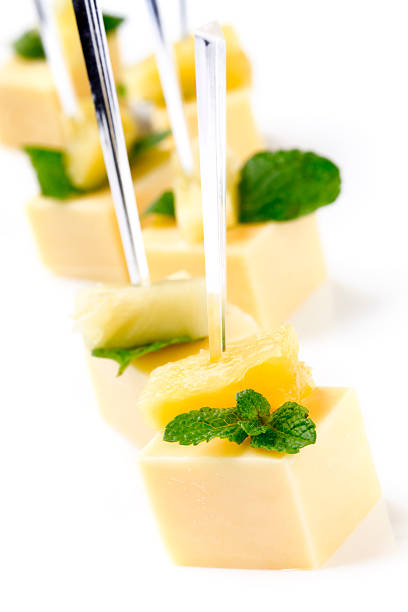 istock Cheese skewers decorated with mint on white background 123116914