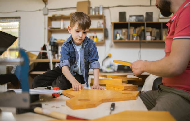 istock Father and Son Making a Birdhouse 1231259940