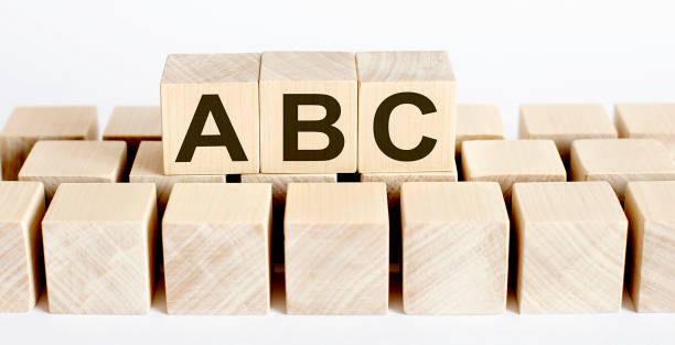istock ABC word from wooden blocks on desk, search engine optimization concept 1231326858