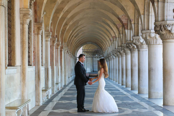 istock Groom and bride on a corridor 1231341801