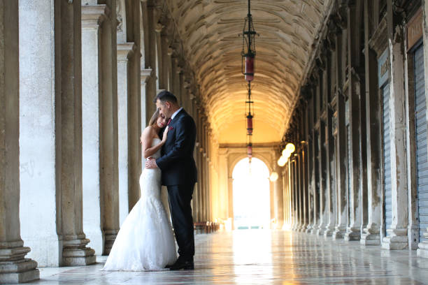 istock Groom and bride on a corridor 1231342318