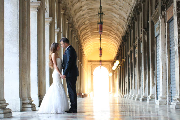 istock Groom and bride on a corridor 1231342494