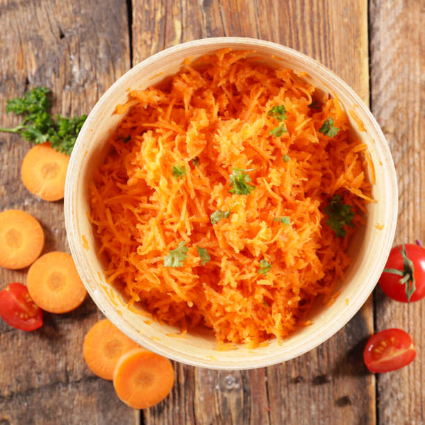 istock grated carrot- fresh carrot salad with parsley 1231383501