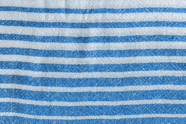 istock Natural classic blue and white striped woven fabric texture. Rough textile background 1231385058