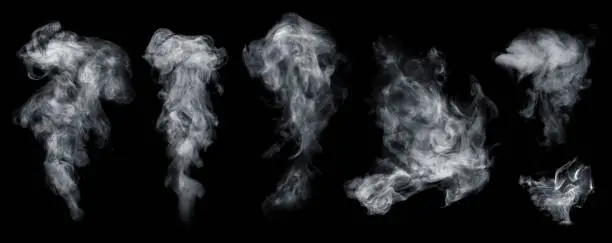 Photo of Fog or smoke set isolated on black background.