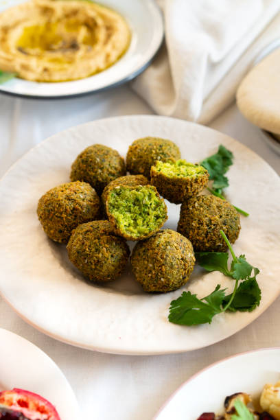 istock Green falafel with parsley and veggies 1231417342