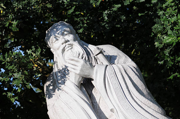 Hand of an old Jesus Christ statue in a cemetery