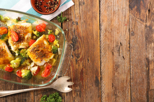 istock baked fish fillet with vegetable 1231427071