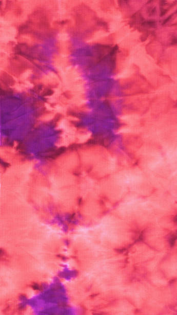 istock Abstract hand painted  red fabric background with irregular colorful spots 1231470039