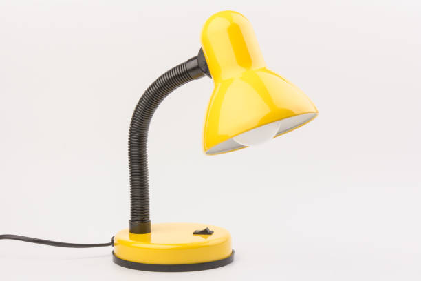 istock Yellow desk lamp isolated on white background 1231474150