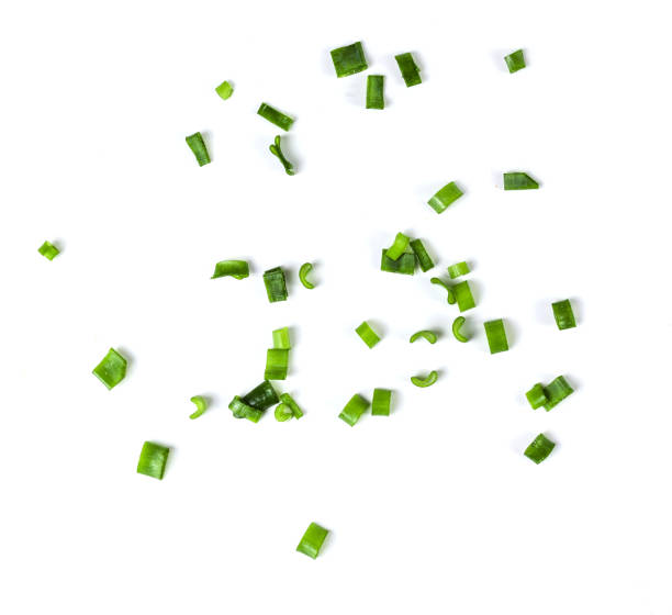 istock Green onion sliced in rings on a white background 1231510127