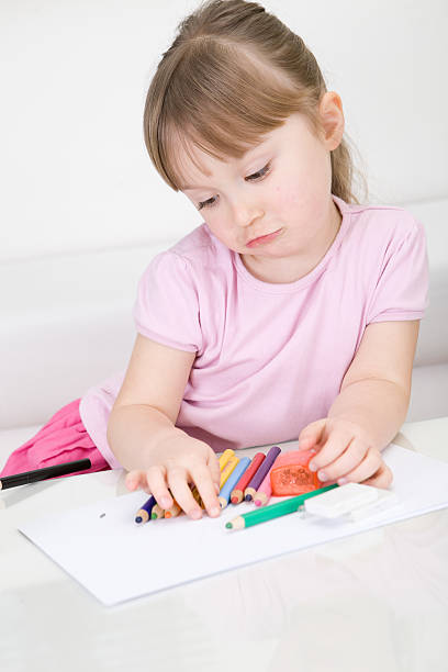 istock young girl drawing 123151044