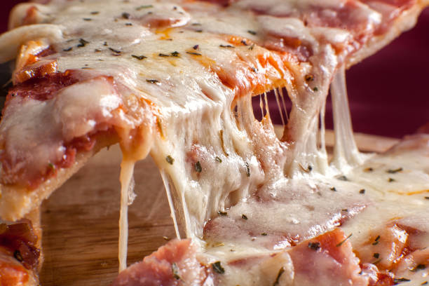 istock A slice of pizza with melted cheese 1231517781