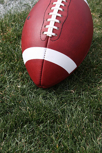 istock American Football on the Grass 123158275