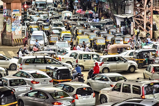 Mumbai, India - July 2016: Traffic in India's largest city. Mumbai is the centre of the Mumbai Metropolitan Region, the sixth most populous metropolitan area in the world with a population of over 23.64 million.