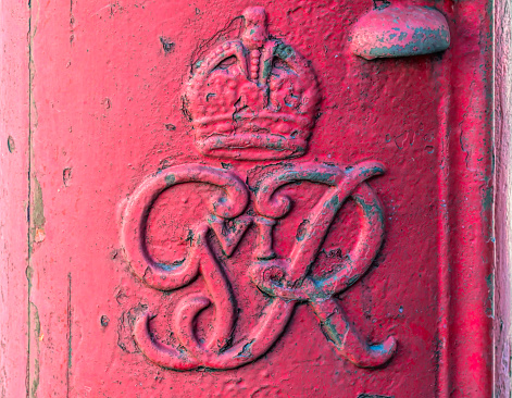 Red English post box London royal cypher George VI