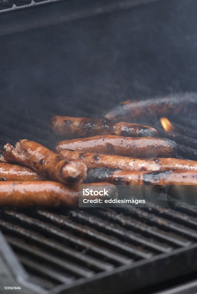 Bruciate Hotdogs - Foto stock royalty-free di Alla brace