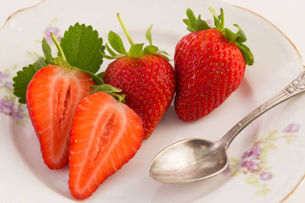 istock Fresh strawberry on old plate 1231685811