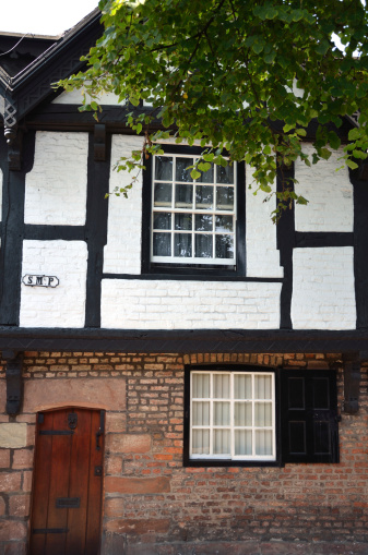 One of the Nine Houses next to the walls in Chester City centre. This just shows one of the six remaining houses with the plaque SMP which stands for St Michaels Parish.
