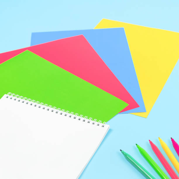 istock Color paper, paint and school stationery on blue 1231745367