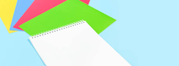 istock Color paper, paint and school stationery on blue 1231745373