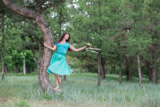 istock Dancer girl at the spring garden 1231747993