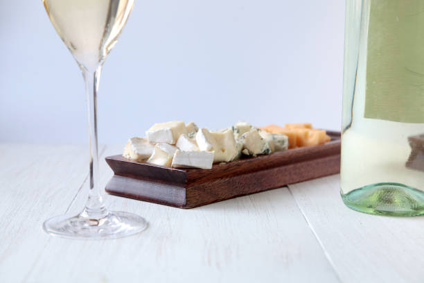glasses of rose with grapes, bread and cheese