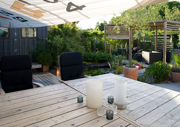 Outdoor dining area with a shade sail.