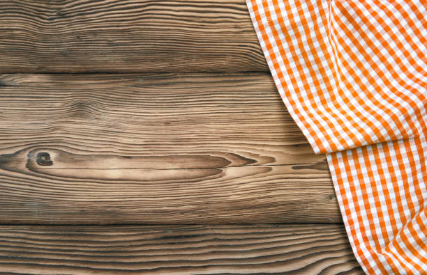 orange checkered picnic cloth on wooden background,food design tabletop,backdrop. - pano da cozinha imagens e fotografias de stock