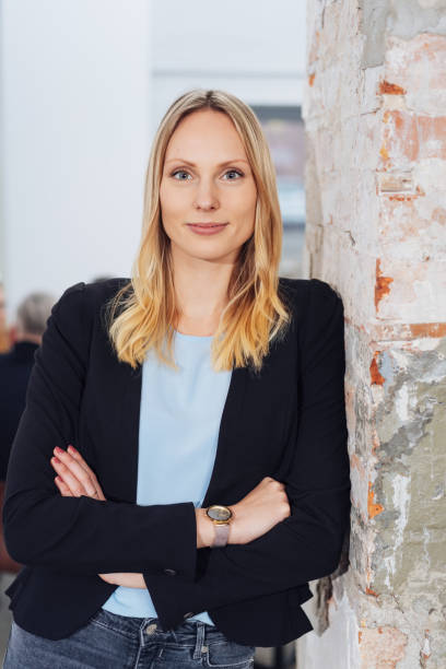 istock Young professional woman with a confident smile 1231806198