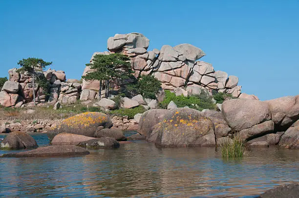 This rock formation faces at the Atlanticcoast, near Perros-Guirec, Brittany, France. Its a part of the famous coast of granite rose.