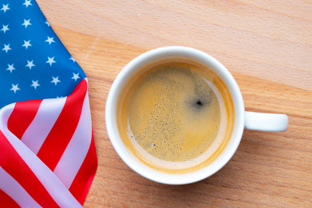 independence day usa concept. memorial day. cup of coffee with american flag on white background top view - photography starbucks flag sign imagens e fotografias de stock
