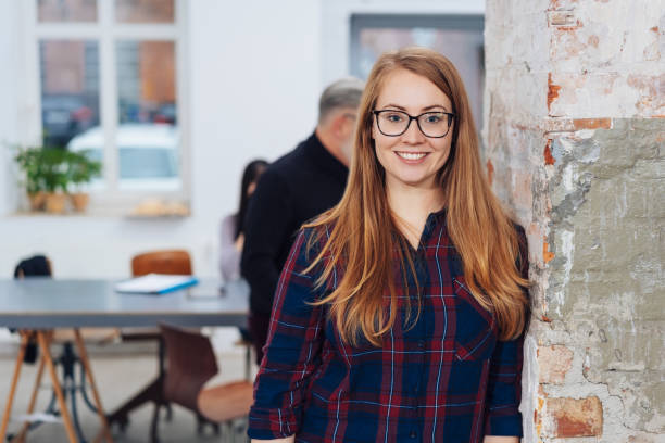 istock Attractive young redhead businesswoman 1231811398