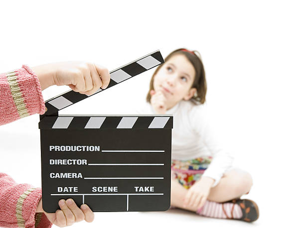 istock little girl with a clapperboard 123181477