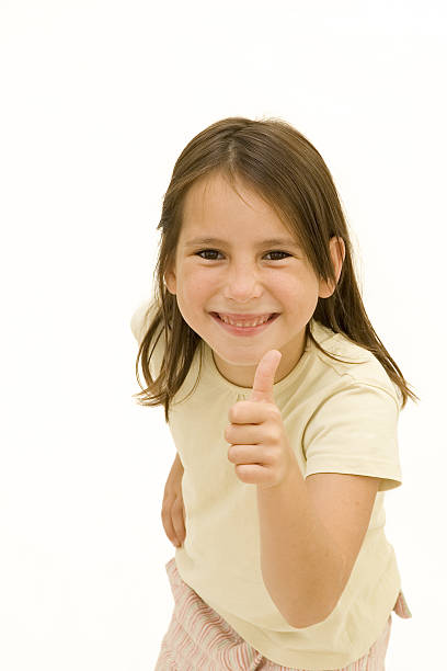 istock happy young girl giving ok 123182082