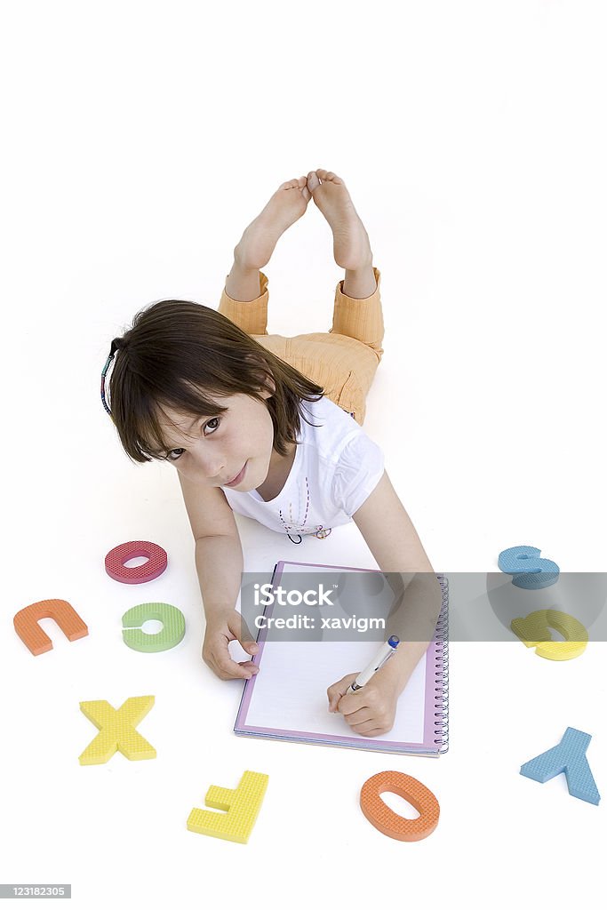 young girl doing her homework  Adolescence Stock Photo