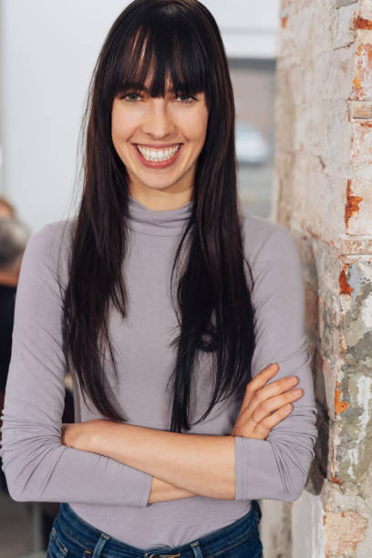 istock Attractive slender woman with a vivacious smile 1231831611