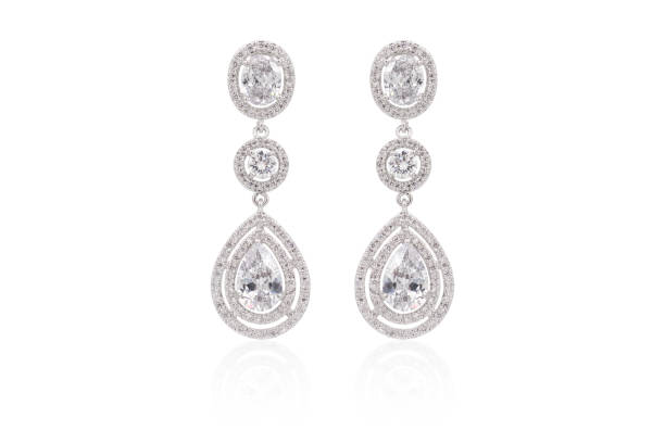 istock Earrings isolated, with white crystals and diamonds. 1231863020
