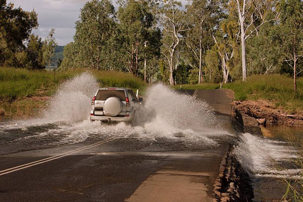 istock Car Driving Through Flooded Causeway 123186578