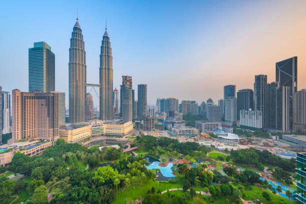 istock Kuala Lumpur, Malaysia park and skyline 1231880068