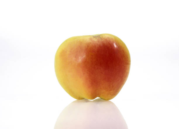 A group of ripe peaches on table. Fresh peach concept
