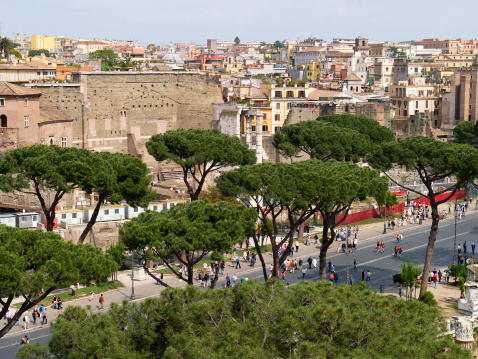 Top view of a portion of the historic center of Cagliari with a roundabout on the side and the historic buildings that surround it.