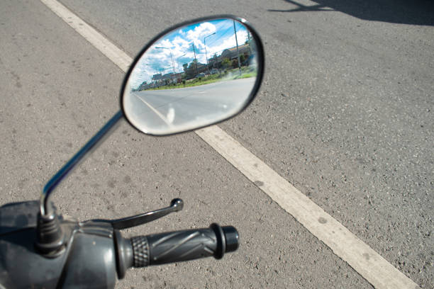 istock hot summer on the side mirror of motorcycle 1231950348