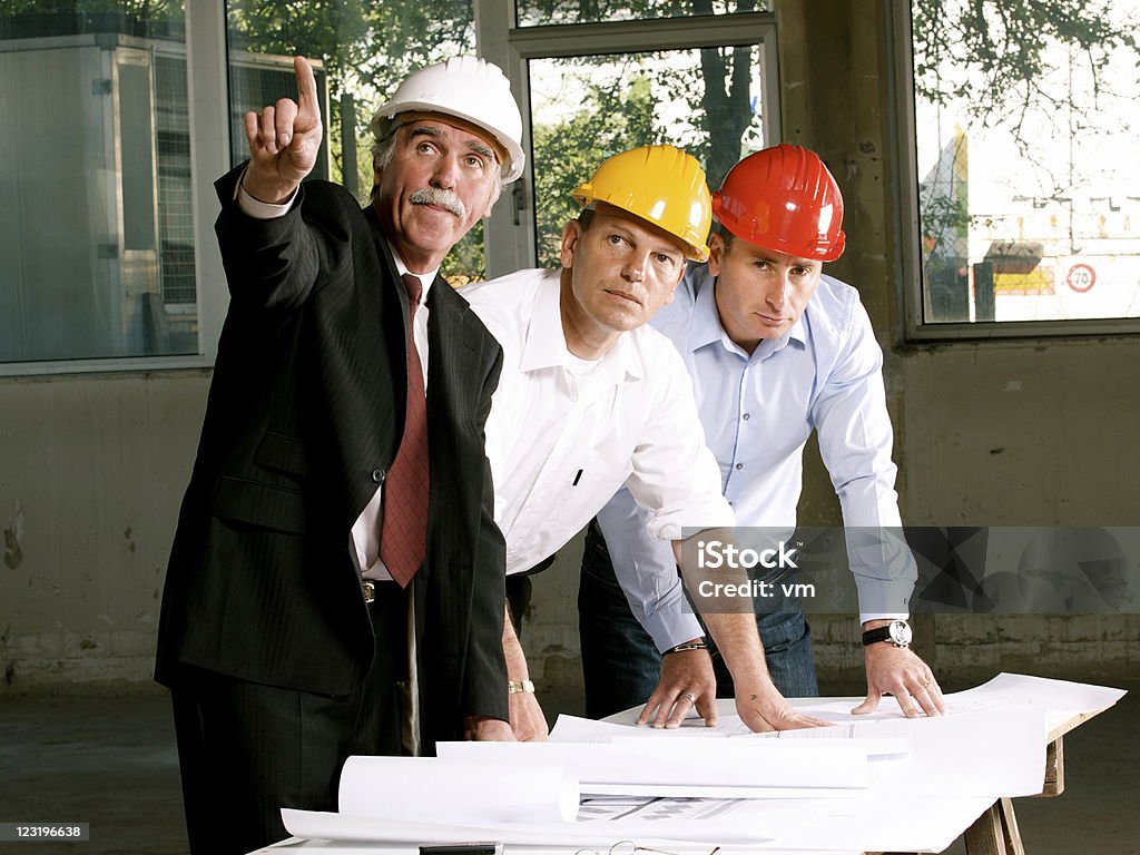 Engineer inspects the construction site  Adult Stock Photo