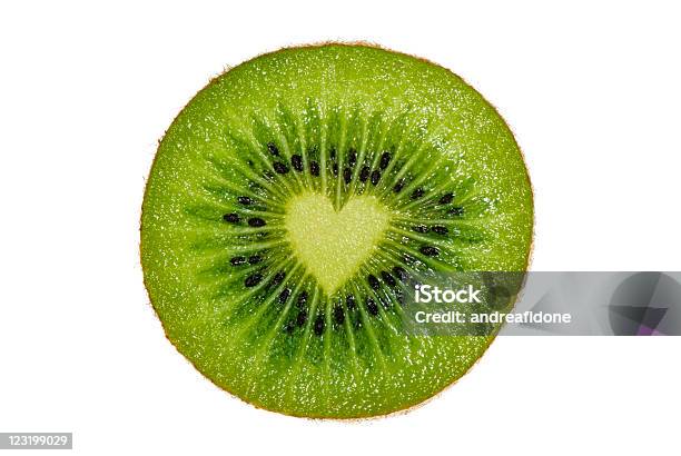 Photo libre de droit de Kiwi Partie Avec Coeur À Lintérieur Isolé Sur Fond Blanc banque d'images et plus d'images libres de droit de Aliment